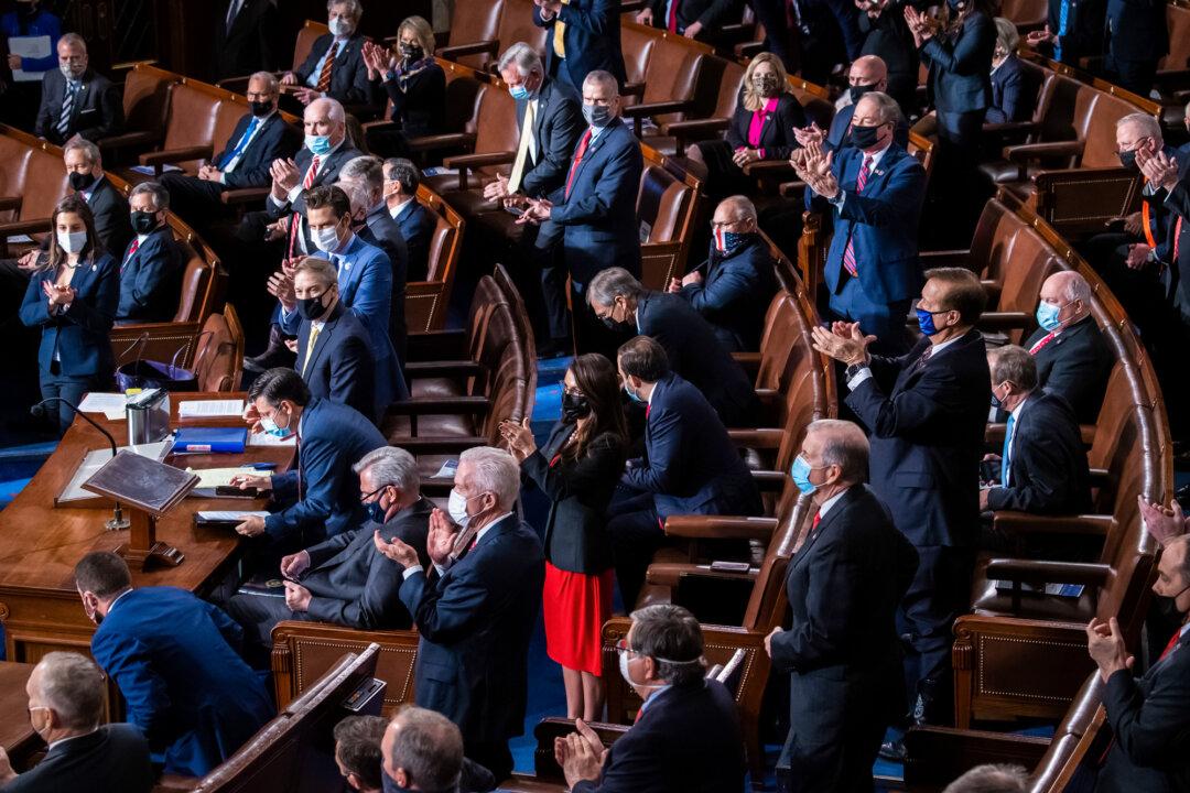 Republican members of Congress applaud during a joint session of Congress in Washington on Jan. 6, 2021. Documents show Special Counsel Jack Smith obtained call records of multiple GOP lawmakers during the “Arctic Frost” investigation. (Saul Loeb/Pool/Getty Images)