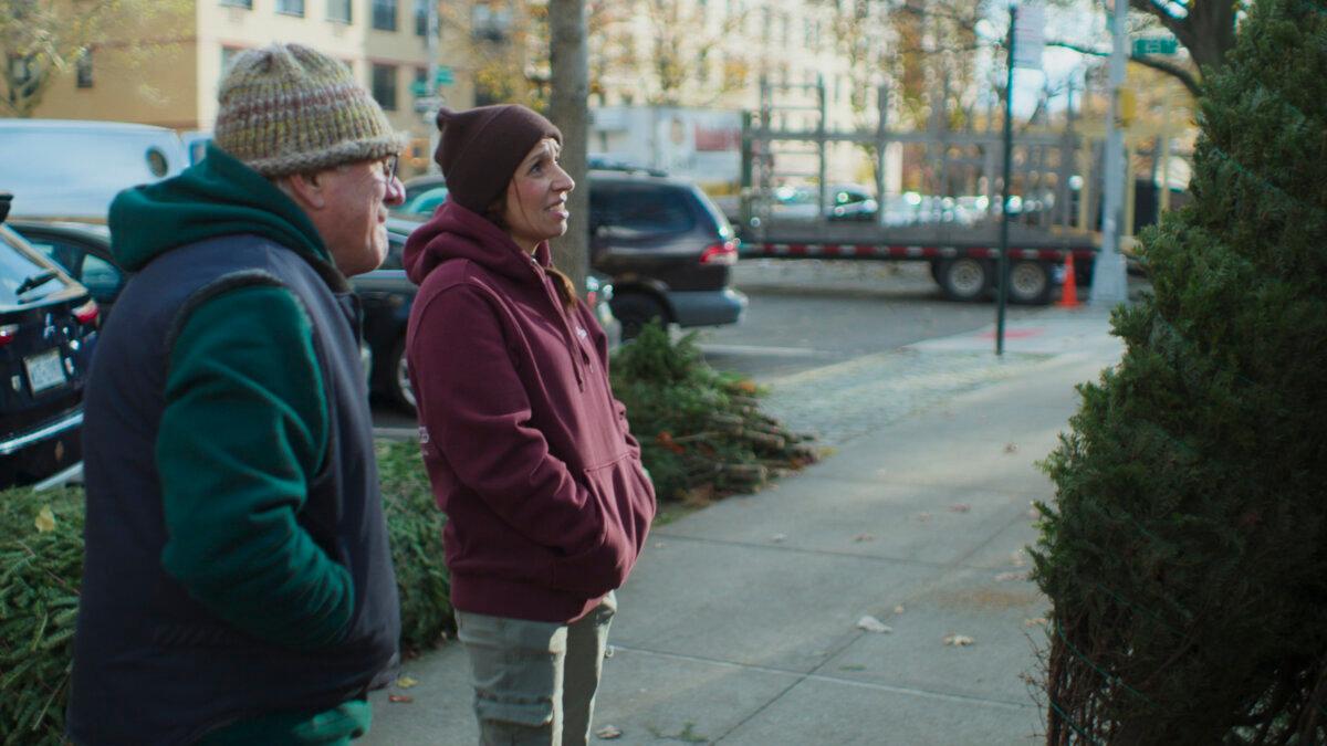 George and Ciree Nash of Uptown Christmas Trees at their New York tree stand in "The Merchants of Joy." (Amazon MGM Studios)
