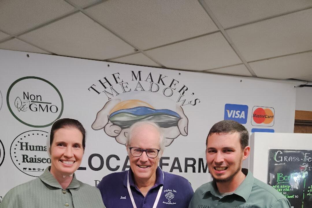 John and Jaima Filbrun, who run Maker’s Meadow, a regenerative farm in West Alexandria, Ohio, pose with regenerative farming expert Joel Salatin. The Filbrun family has owned the farm since the late 1960s, evolving from dairy cows and row crops to 100 percent grass-fed beef and lamb, plus pasture-raised chicken, turkey, and pork, supplemented with organic feed. (Courtesy of the Filbrun family)