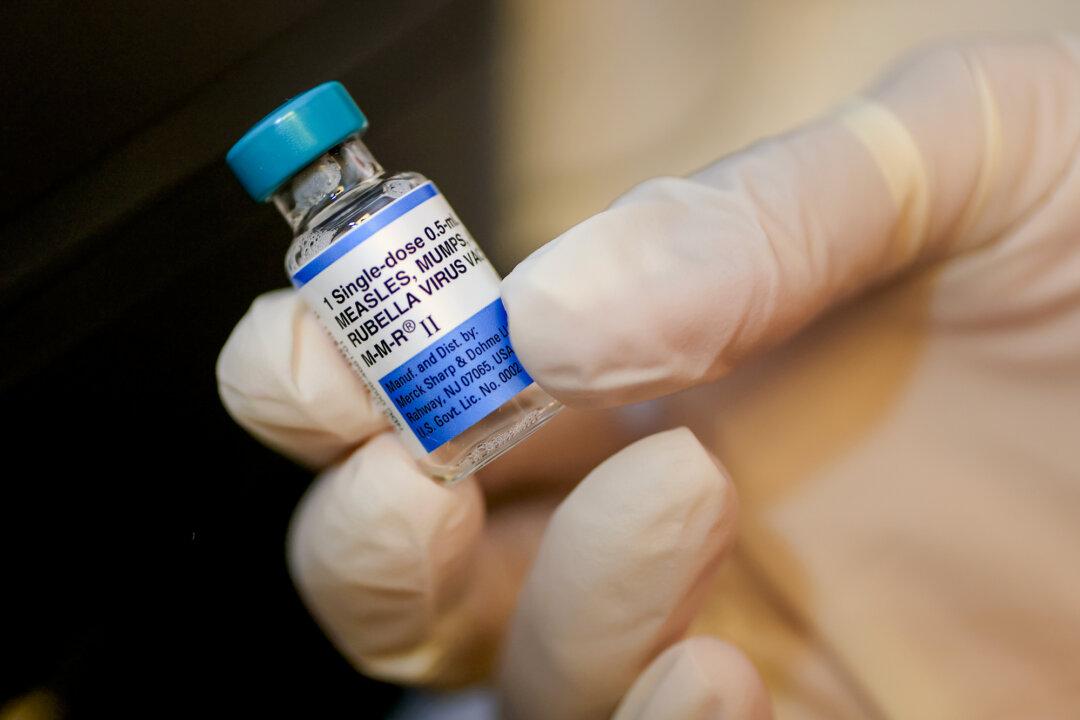 A vial of the MMR vaccine is prepared at a pediatric office in Coral Gables, Fla., on Sept. 12, 2025. (Joe Raedle/Getty Images)