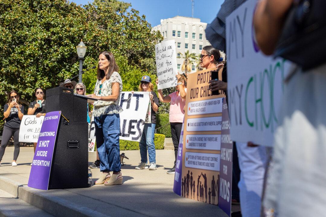 Attorney Erin Friday joins “Our Duty” supporters at the California State Capitol Building in Sacramento on Aug. 28, 2023. Friday gained national attention for successfully steering her daughter with ADHD away from identifying as a transgender male. (John Fredricks/The Epoch Times)