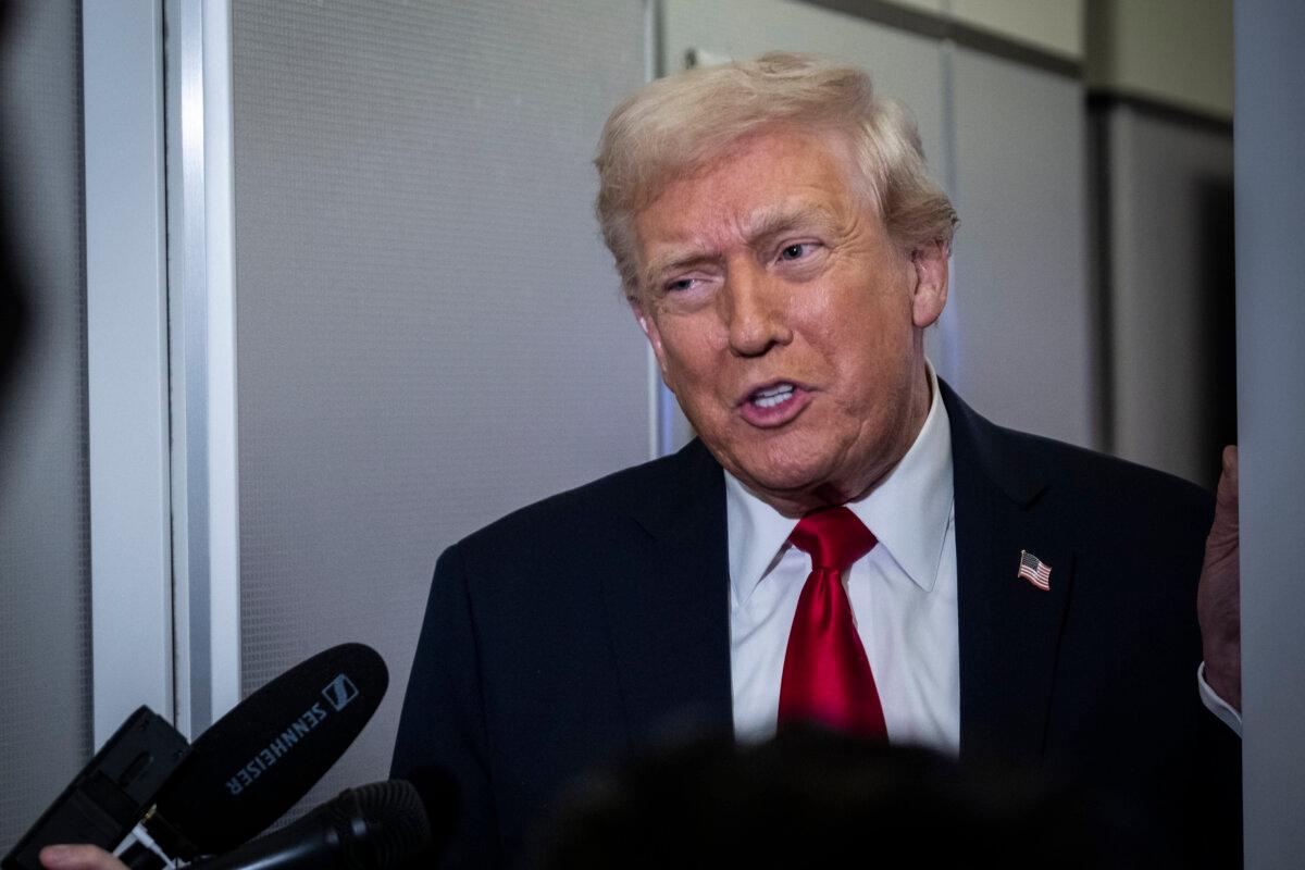 President Donald Trump speaks to the media aboard Air Force One in flight en route to Florida on Nov. 25, 2025. (Pete Marovich/Getty Images)