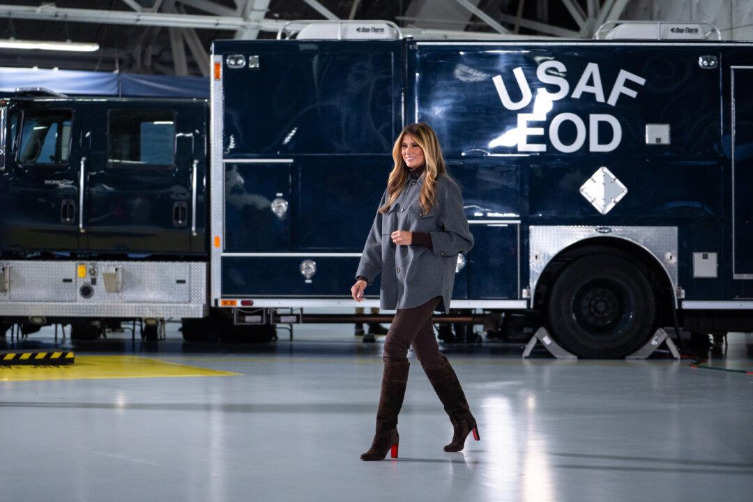 First Lady Melania Trump after delivering remarks to military personnel and their families during a Red Cross holiday care package-building and card-writing event at Joint Base Andrews, Md., on Dec. 1, 2025. (Madalina Kilroy/The Epoch Times)