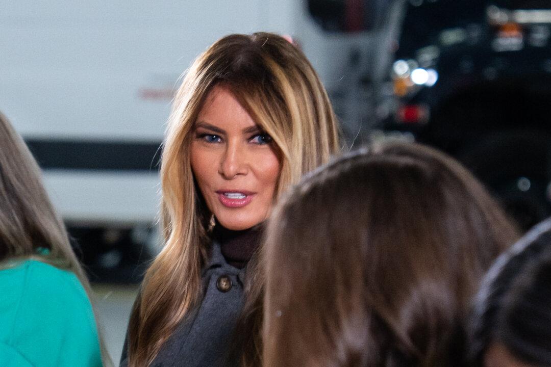 First Lady Melania Trump during a Red Cross holiday care package-building and card-writing event at Joint Base Andrews, Md., on Dec. 1, 2025. (Madalina Kilroy/The Epoch Times)
