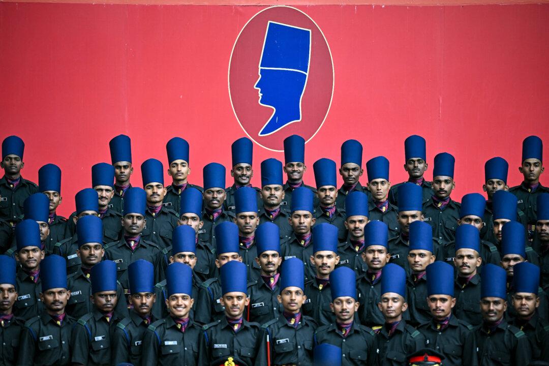 Newly graduated cadets called ‘Agniveer’ pose for a group photograph after their parade in Bengaluru, India, on Dec. 3, 2025. (Idrees Mohammed/AFP via Getty Images)