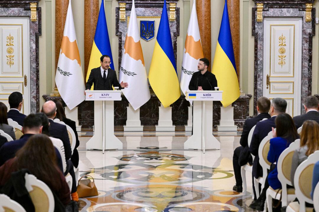 Ukraine President Volodymyr Zelenskyy listens to Cyprus President Nikos Christodoulides during a joint media briefing following their meeting in Kyiv on Dec. 4, 2025, amid the Russian invasion of Ukraine. (Genya Savilov/AFP via Getty Images)