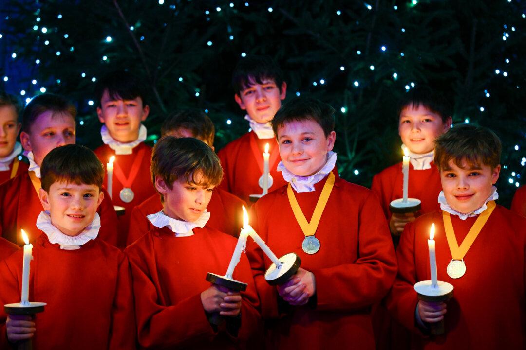 Choristers sing during the lighting of the Christmas tree at Winchester Cathedral in England on Dec. 4, 2025. Winchester Cathedral’s Christmas tree lights are switched on during a short ceremony as part of the annual blessing of the Christmas tree. The tree will remain on display, with the choir, throughout December. (Finnbarr Webster/Getty Images)