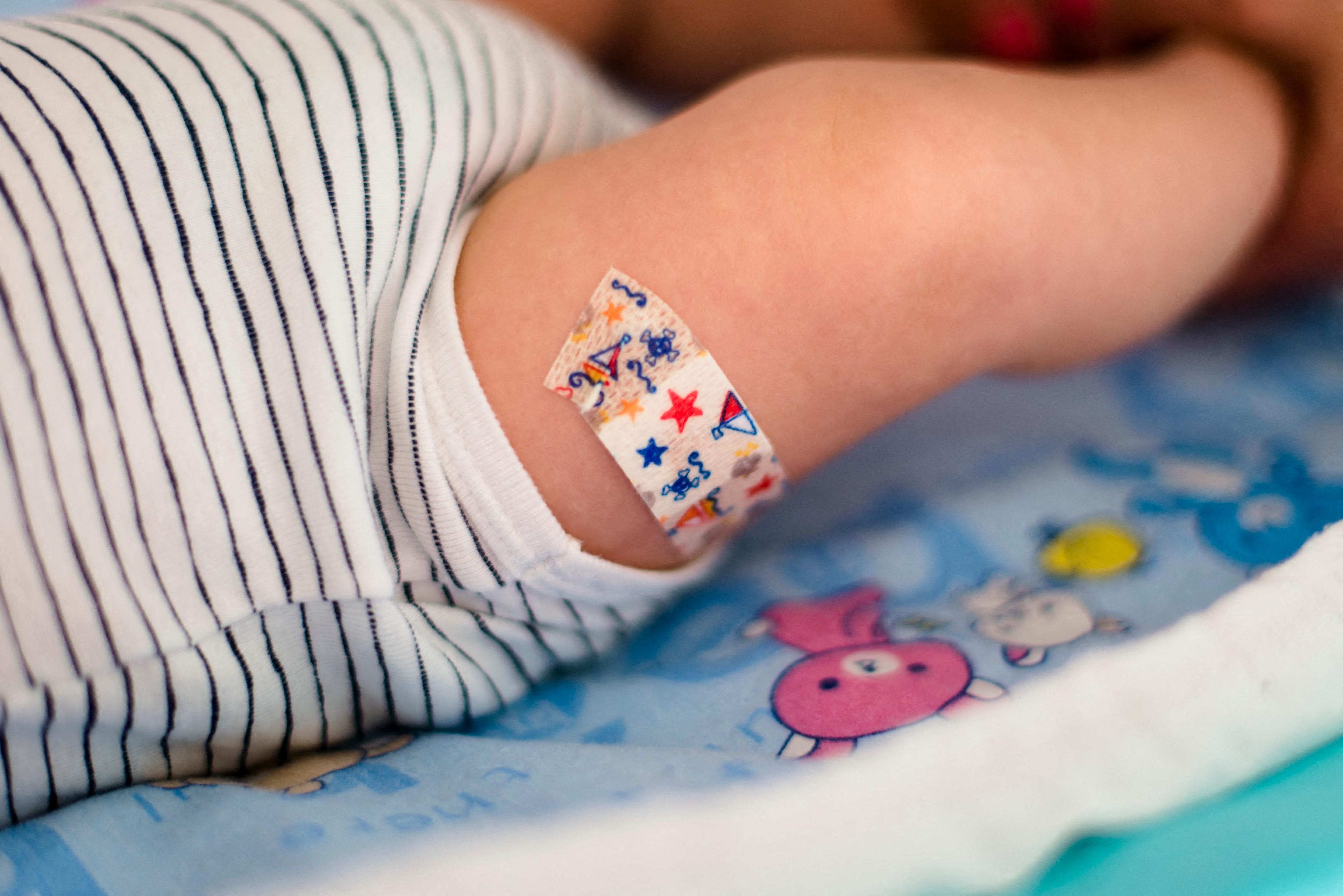 A baby after receiving a vaccine for hepatitis B and other diseases, in a file illustration photograph. (Riccardo Milani/Hans Lucas/AFP via Getty Images)