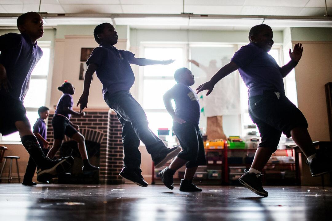 Students attend dance class at the Encore Academy charter school in New Orleans on May 13, 2015. President Donald Trump in April directed the Education Department to outline how it would tackle racial discrimination in schools, including in disciplinary actions. (Mario Tama/Getty Images)