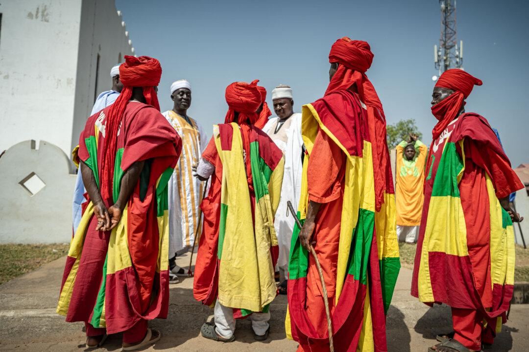 Members of the Emir of Minna's royal guard stand outside the Central Mosque in Minna, Nigeria, on Dec. 5, 2025. (Light Oriye Tamunotonye/AFP via Getty Images)