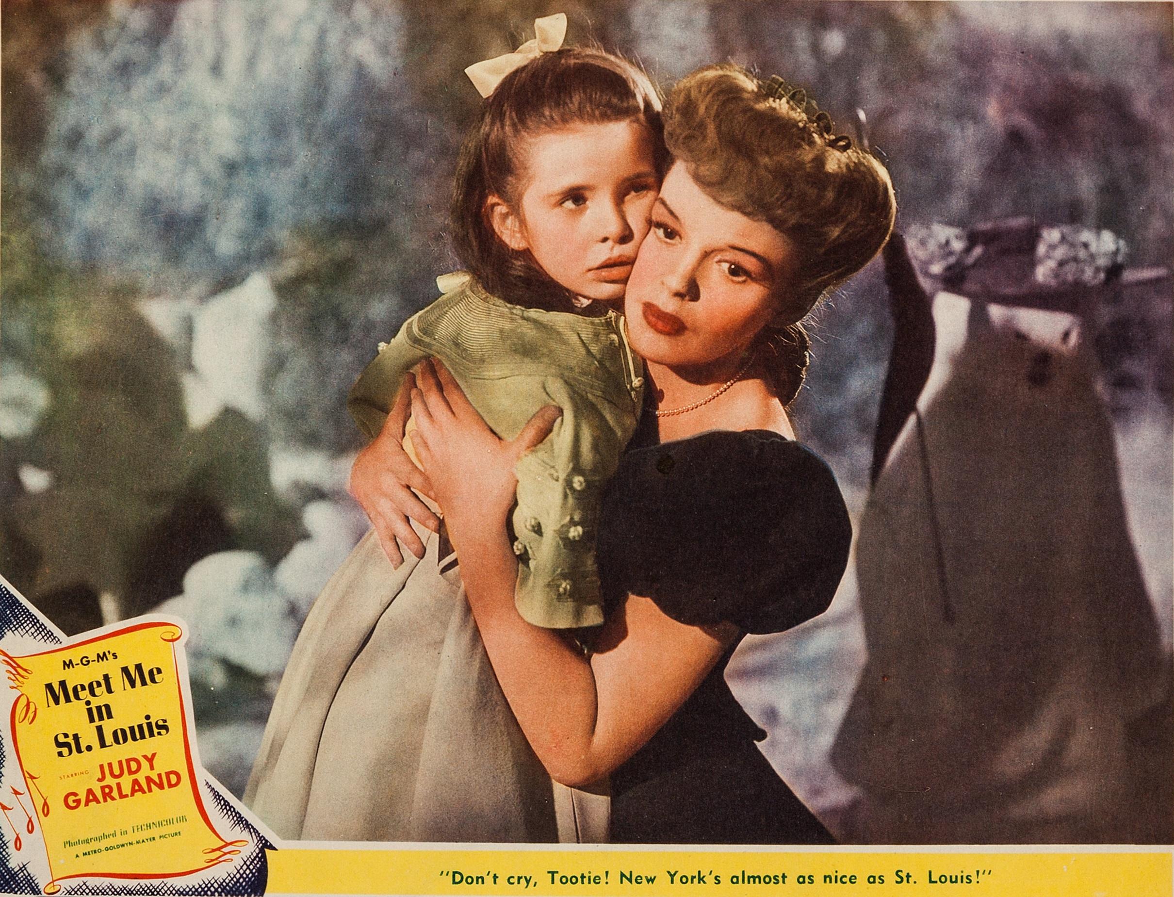 Lobby card for the 1944 film "Meet Me in St. Louis," starring Judy Garland (R) and Margaret O'Brien. (MGM)