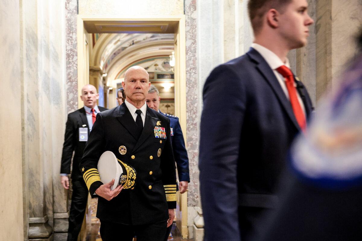 Navy Adm. Frank Bradley departs from the U.S. Capitol on Dec. 4, 2025. (Anna Moneymaker/Getty Images)