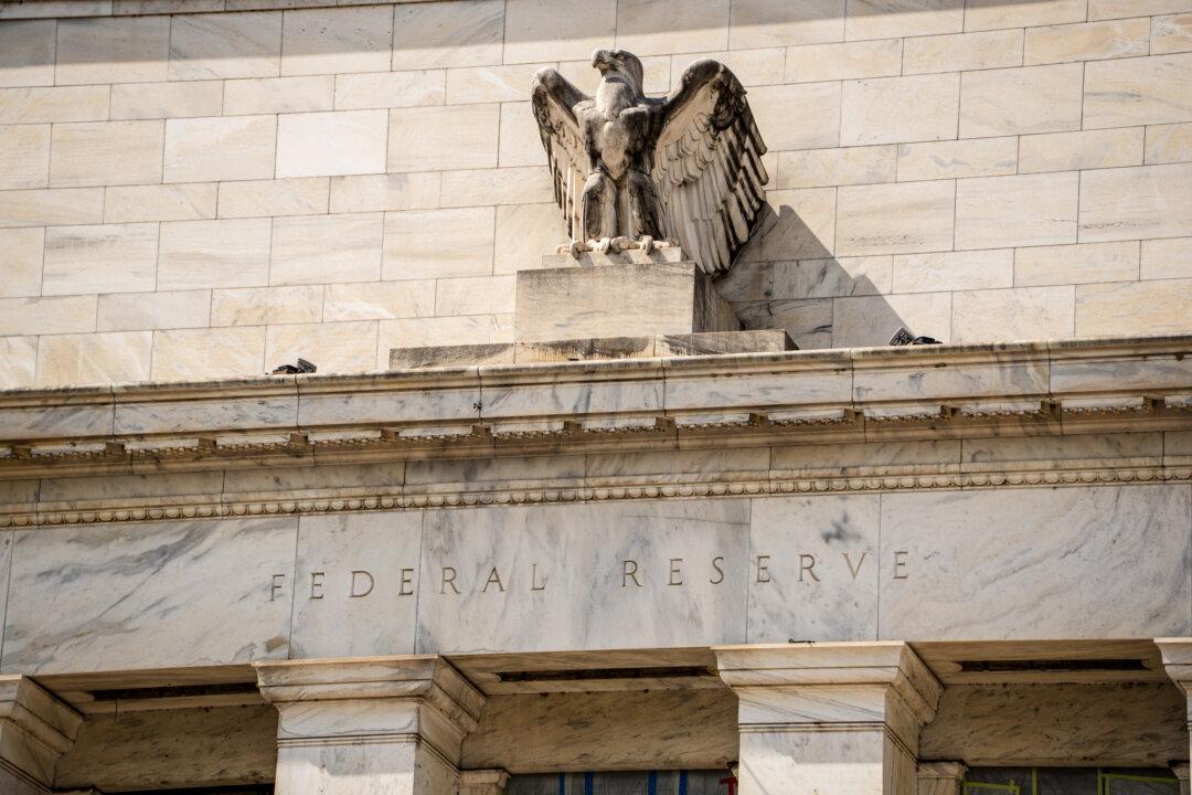 The Federal Reserve in Washington on July 21, 2025. Kiyosaki said the Fed’s policies are devaluing the currency because today’s Federal Reserve notes aren’t tradeable for gold or silver. (Madalina Kilroy/The Epoch Times)