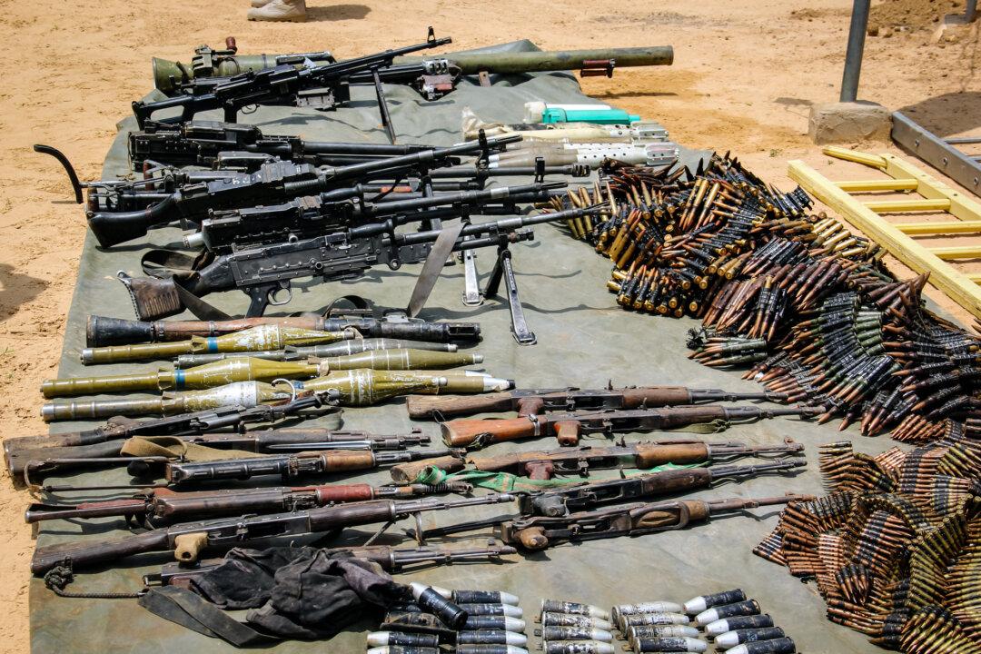 Arms and ammunition recovered from Boko Haram jihadists are displayed at the 120th Battalion headquarters in Goniri, Nigeria, on July 3, 2019. Boko Haram, loosely translated “Western education is forbidden,” has been designated a terrorist organization by the United States since 2013. (Audu Marte/AFP via Getty Images)