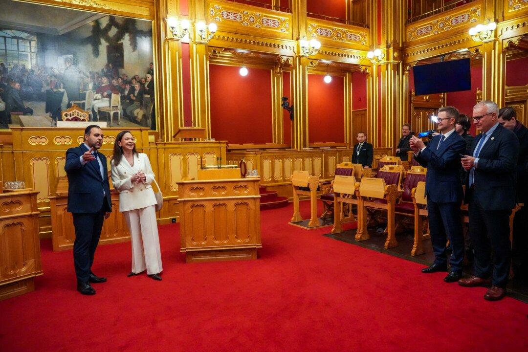 Nobel Peace Prize winner Venezuelan opposition leader María Corina Machado visits the Storting (Norway's Parliament) with the Storting President Masud Gharahkhani in Oslo, Norway, on Dec. 11, 2025. Machado arrived in Oslo hours after her daughter collected the award on her behalf. (Ole Berg-Rusten/NTB/AFP via Getty Images)