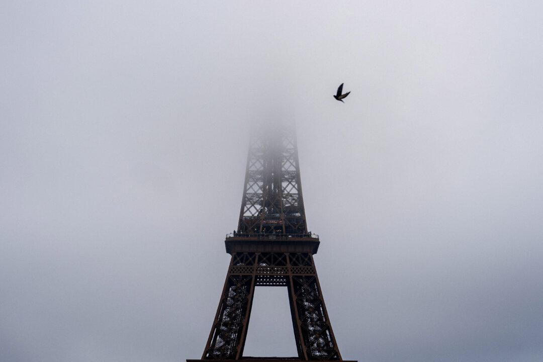 The Eiffel Tower on a foggy day in Paris, on Dec. 11, 2025. (Dimitar Dilkoff/AFP via Getty Images)