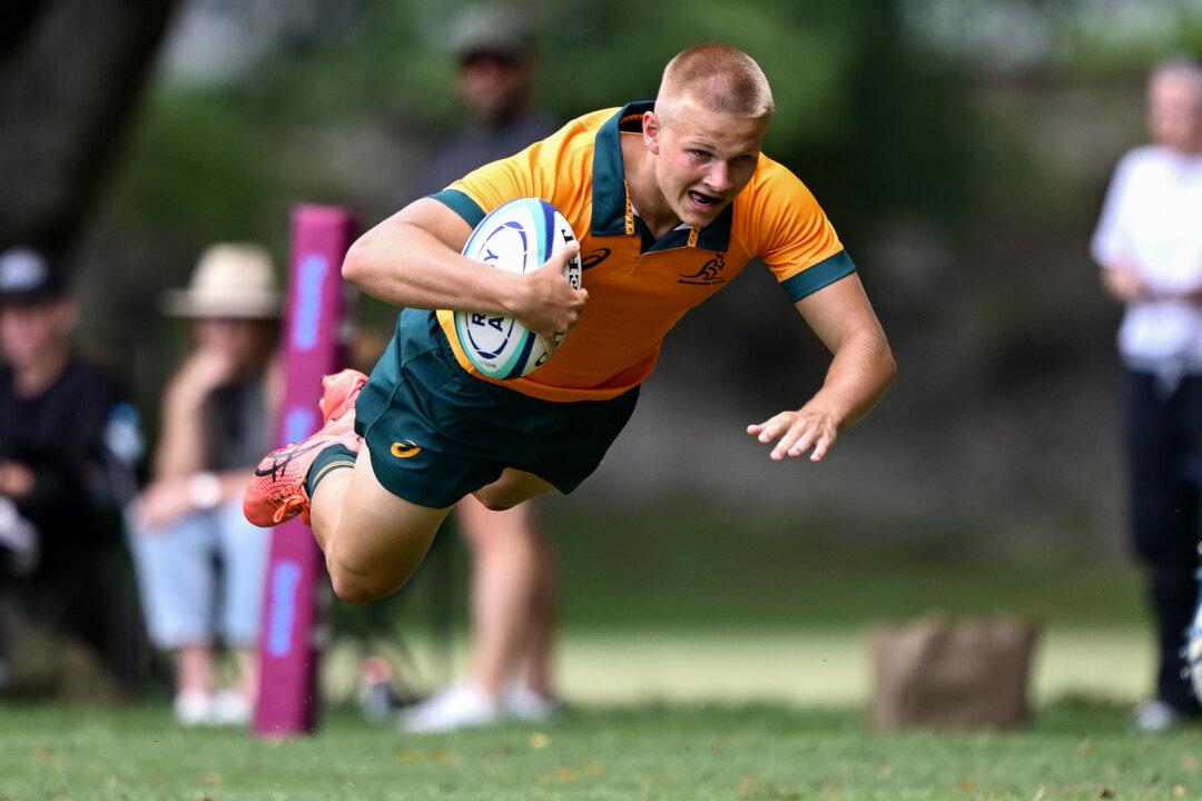 Thomas Longland of Australia scores a try during the match between the Australia U16s and Queensland Reds U17s at Wests Rugby Union Club in Brisbane, Australia, on Dec. 11, 2025. (Bradley Kanaris/Getty Images for Rugby Australia)