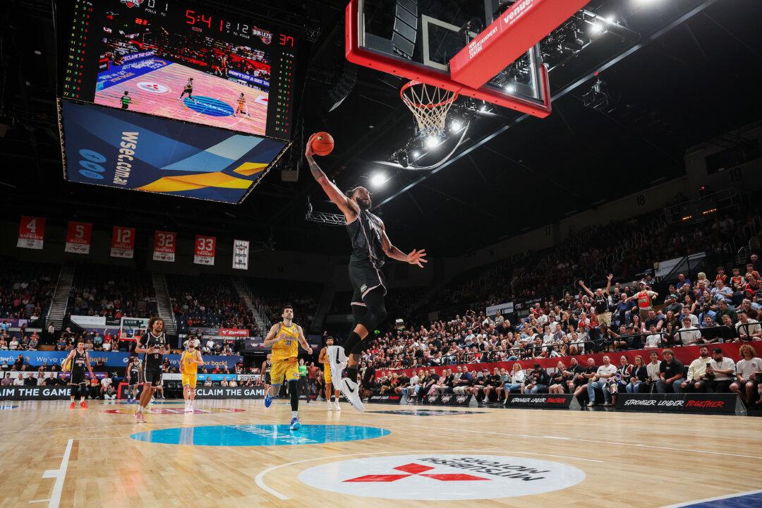 JaVale McGee of the Hawks dunks during the round 12 NBL match between Illawarra Hawks and Brisbane Bullets at WIN Entertainment Center in Wollongong, Australia, on Dec. 11, 2025. (Mark Metcalfe/Getty Images)