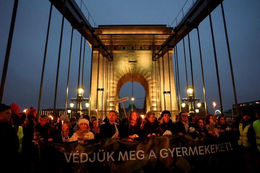 Peter Magyar, leader of Hungary's opposition Tisza party, attends a protest march organized by Tisza over a case of abuse at a juvenile detention center, during an ongoing investigation, in Budapest, Hungary, on Dec. 13, 2025. (Bernadett Szabo/Reuters)