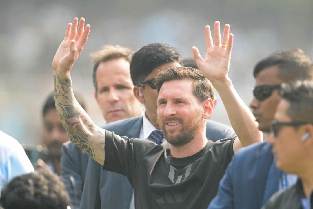 Inter Miami's Argentine forward #10 Lionel Messi arrives at the Salt Lake Stadium in Kolkata, India, on Dec. 13, 2025. Thousands of fans packed into a stadium in eastern India on Dec. 13 to cheer on Messi as the football legend unveiled a 21-meter (70-foot) statue of himself. (Dibyangshu Sarkar/AFP via Getty Images)