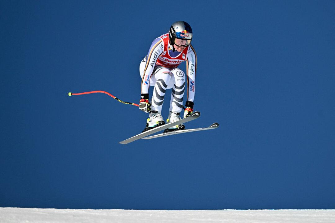 Germany's Emma Aicher competes in the women's downhill race during the FIS Alpine Ski World Cup 2025–2026, in St Moritz, Switzerland, on Dec. 13, 2025. (Fabrice Coffrini/AFP via Getty Images)