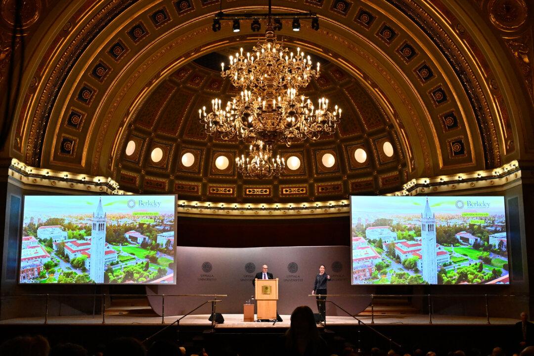 A general overview shows Nobel Prize in Chemistry 2025 laureate U.S.-Jordanian chemist Omar M. Yaghi as he gives a Nobel Prize Lecture in Chemistry in the auditorium of the university building in Uppsala, Sweden, on Dec. 13, 2025. (Pontus Lundahl/TT NEWS AGENCY/AFP via Getty Images)