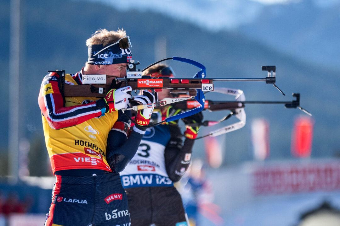 Norway's Johan-Olav Botn competes in the men's 12.5 km pursuit event of the IBU Biathlon World Cup in Hochfilzen, Austria, on Dec. 13, 2025. (Georg Hochmuth/APA/AFP via Getty Images)