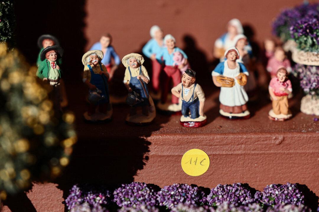 Traditional Provencal santon small hand-painted terracotta figurines representing the Christmas nativity scene, traditional in the Provence region, on display at a stand at “La Foire aux Santons” (the Santons Fair) at the Vieux Port in Marseille, France, on Dec. 13, 2025. (Thibaud Moritz/AFP via Getty Images)