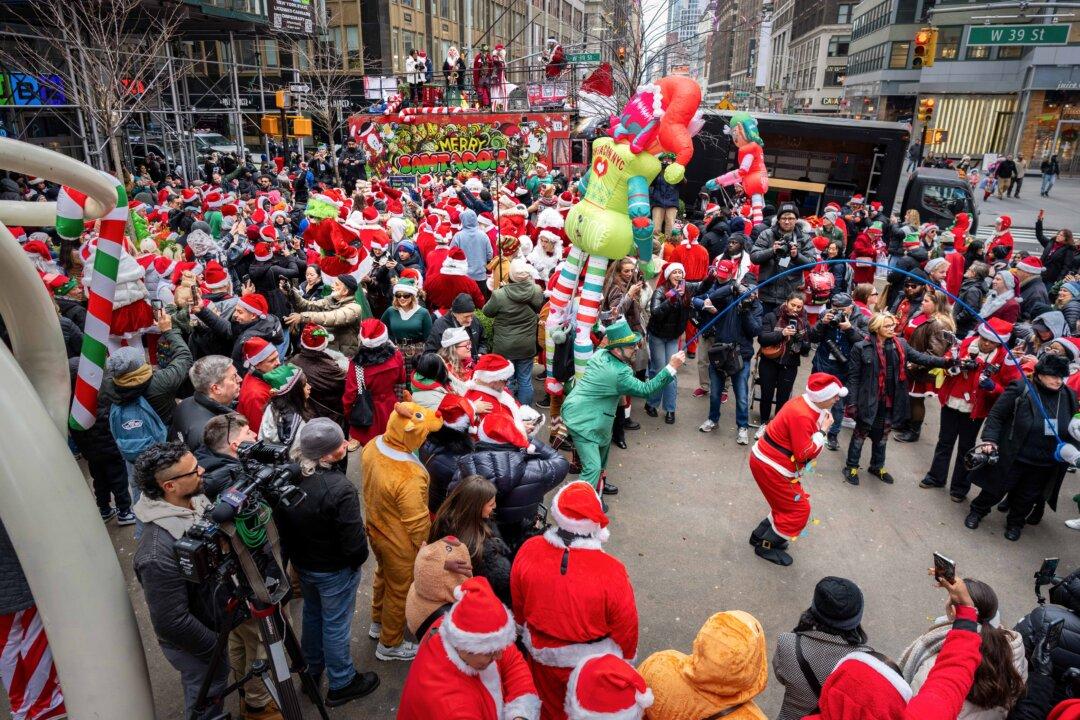 Revelers gather wearing holiday character costumes during the SantaCon bar crawl in New York City, on Dec. 13, 2025. (Jeremy Weine/Getty Images)