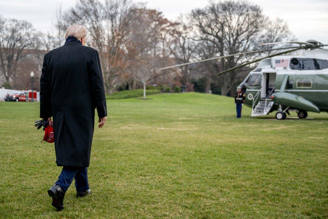 President Donald Trump walks to board Marine One as he departs from the South Lawn of the White House in Washington on Dec. 13, 2025. Trump is on his way to attend the Army vs. Navy college football game in Baltimore. (Daniel Heuer/AFP via Getty Images)
