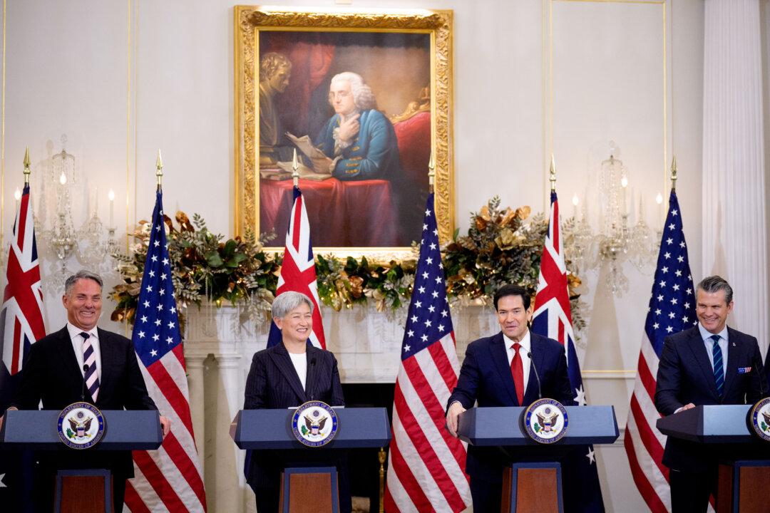 Secretary of State Marco Rubio (2nd-R), accompanied by Australian Deputy Prime Minister and Defense Minister Richard Marles (L), Australian Foreign Minister Penny Wong (2nd-L), and Secretary of War Pete Hegseth (R), speaks during a news conference at the State Department in Washington on Dec. 8, 2025. The U.S. State Department is hosting the 35th Australia-United States Ministerial Consultations. (Andrew Harnik/Getty Images)