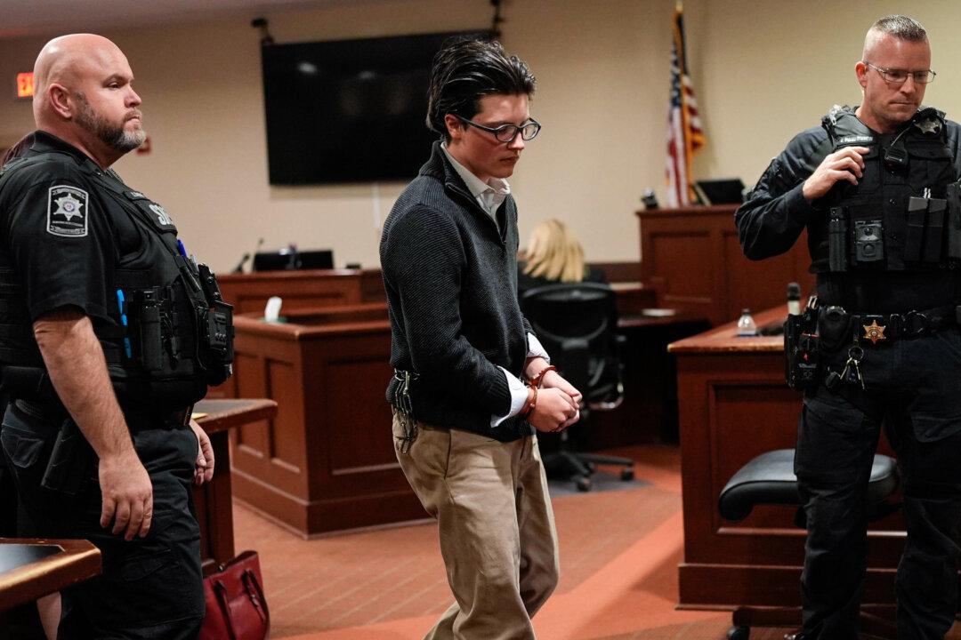 School shooting suspect Colt Gray attends court for a status hearing at the Barrow County Courthouse, in Winder, Ga., on Dec. 9, 2025. Colt, who was 14 years old at the time of the September 2024 shooting at Apalachee High School, faces 55 counts in what was the deadliest school shooting in Georgia history. (Mike Stewart-Pool/Getty Images)