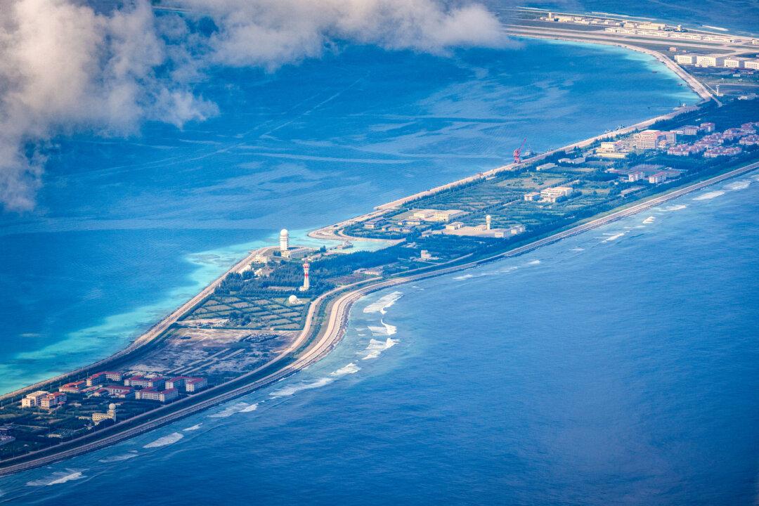 Buildings and structures sit on an artificial island built by China in the Spratly Islands in the South China Sea on Oct. 25, 2022. The Chinese Communist Party has expanded its influence in the Indo-Pacific by building and militarizing artificial islands in the South China Sea, a key trade route. (Ezra Acayan/Getty Images)
