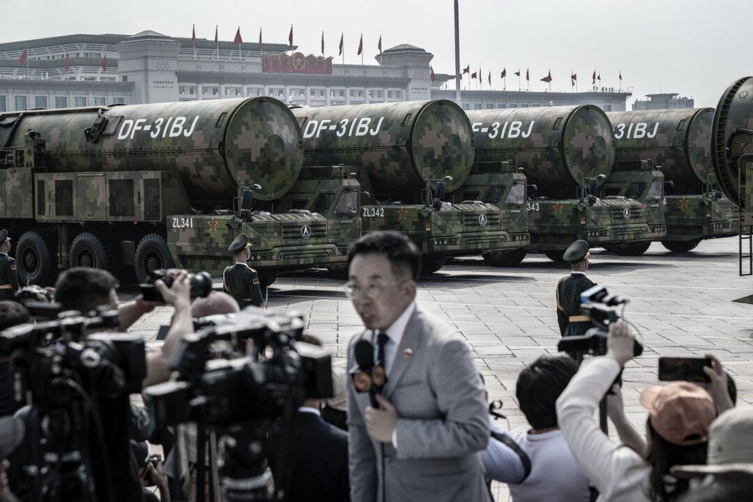 Nuclear-capable DF-31BJ ballistic missiles are unveiled on transporters during a military parade in Tiananmen Square in Beijing on Sept. 3, 2025. (Kevin Frayer/Getty Images)
