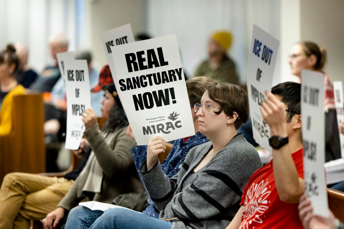 Community members gather for a public hearing as the Minneapolis City Council considers strengthening the city’s separation ordinance barring cooperation with ICE in Minneapolis, Minn., on Dec. 9, 2025. (Jenn Ackerman for The Epoch Times)
