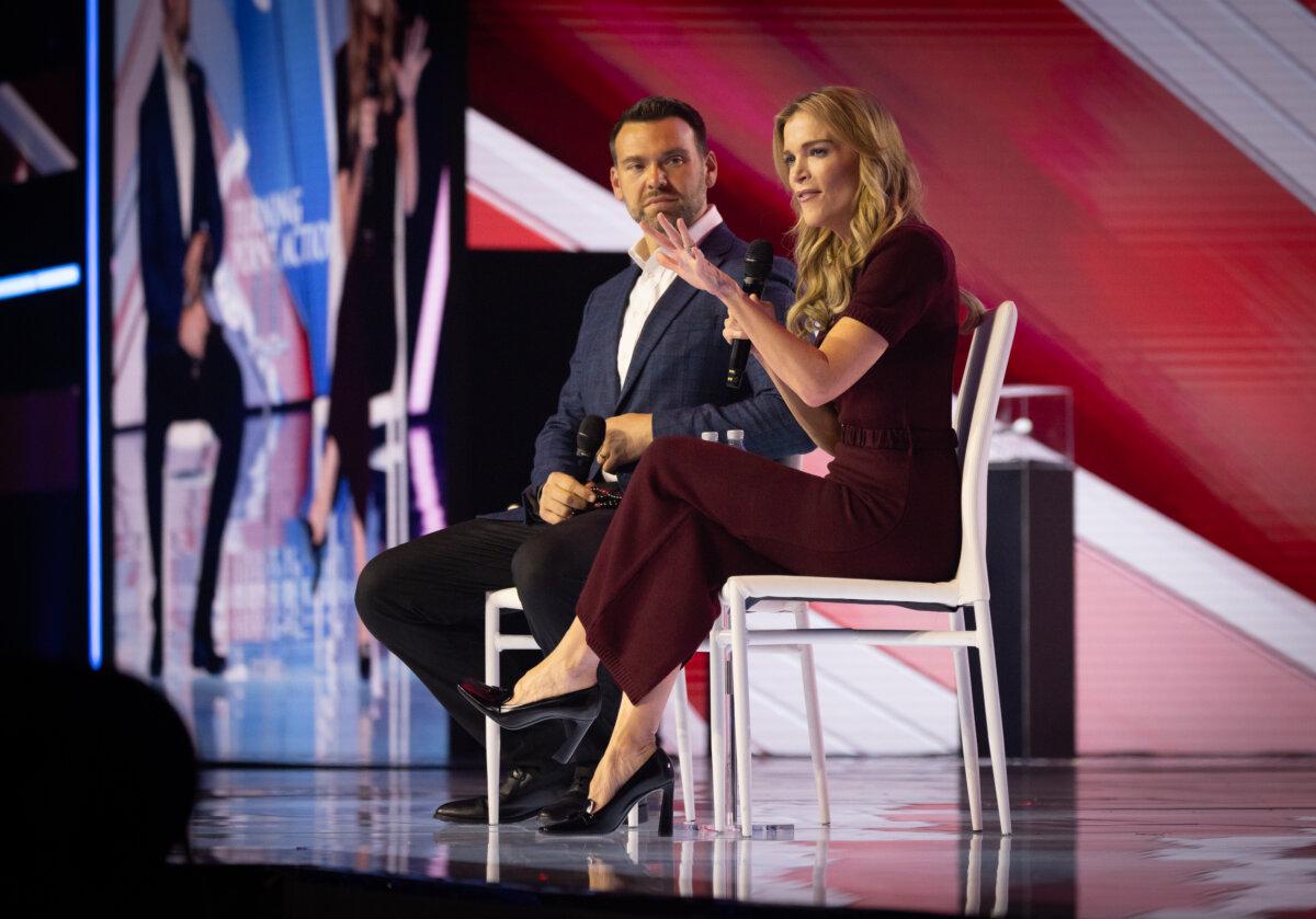 Megyn Kelly (R) and Jack Posobiec (L) speak at Turning Point USA's AmericaFest in Phoenix on Dec. 19, 2025. (John Fredricks/The Epoch Times)