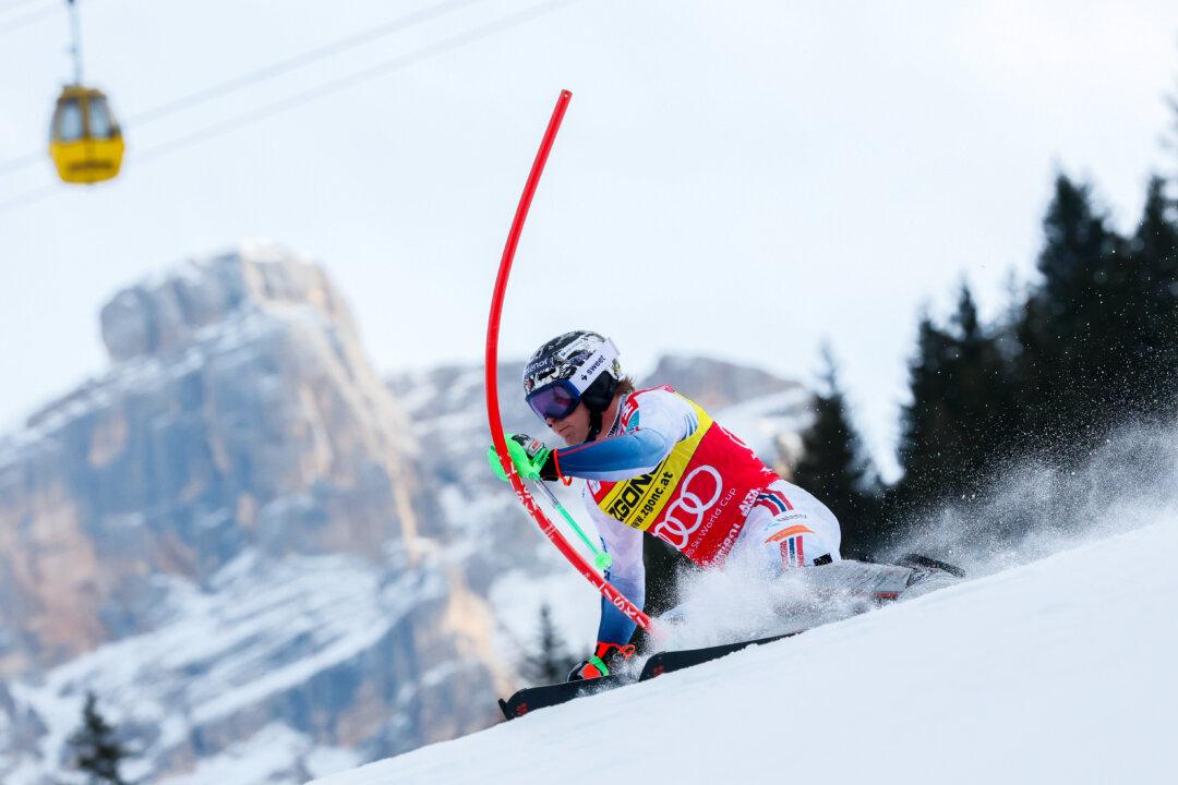 Timon Haugan of Team Norway in action during the Audi FIS Alpine Ski World Cup Men's Slalom in Alta Badia, Italy, on Dec. 22, 2025. (Christophe Pallot/Agence Zoom/Getty Images)