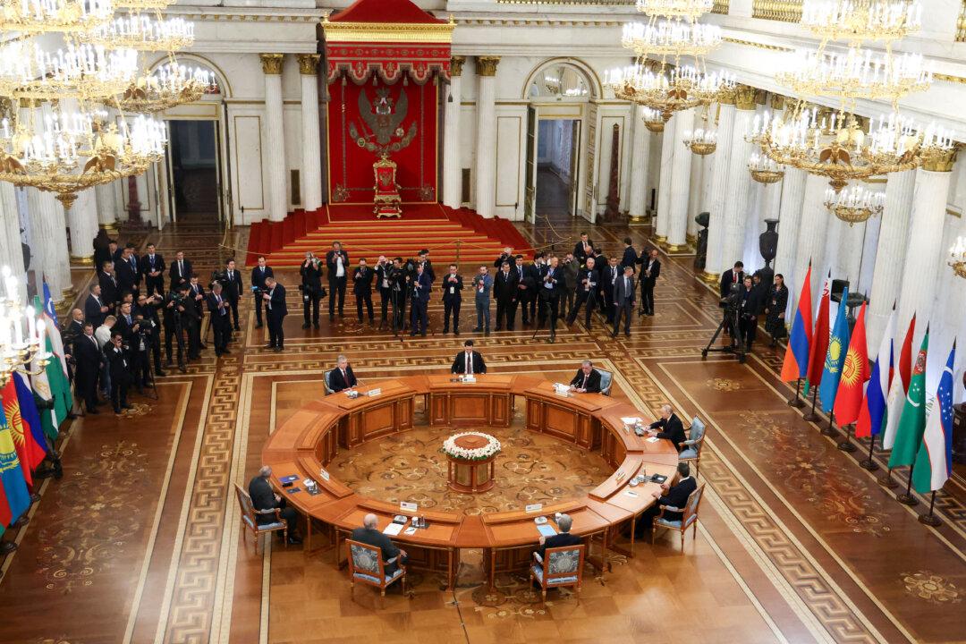 Participants including Russia's President Vladimir Putin attend an informal summit of the Commonwealth of Independent States leaders at the State Hermitage Museum in Saint Petersburg on Dec. 22, 2025. (Alexander Kazakov/POOL/AFP via Getty Images)