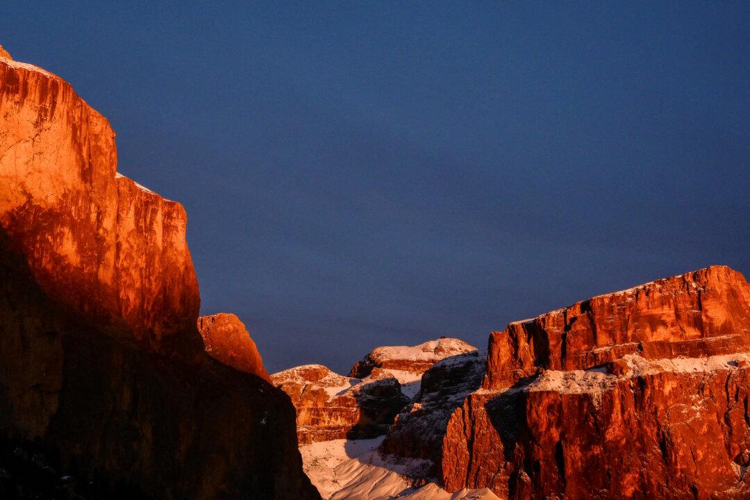 The Dolomiti's Alps at sunset from the Pordoi Pass, Italy, on Dec. 22, 2025. (Stefano Rellandini/AFP via Getty Images)