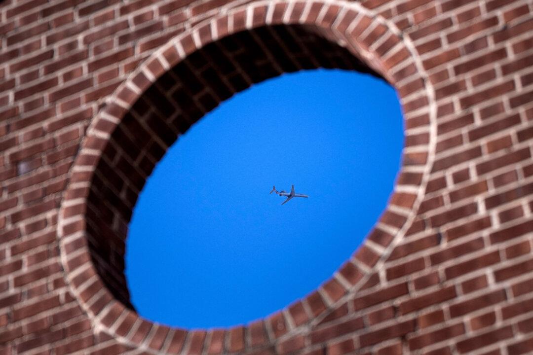 A plane is seen leaving the D.C. area during holiday travel in Washington on Dec. 22, 2025. (Brendan Smialowski/AFP via Getty Images)