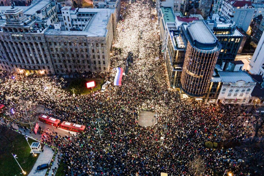 Demonstrators and students gather in front of Serbia's Constitutional Court during a protest to demand accountability for the Novi Sad railway station tragedy in Belgrade on Jan. 12, 2025. Thousands of Serbians protested against corruption and demanded justice for those killed in the train station roof collapse. The demonstrations had been ongoing since a roof in a recently restored train station in the northern city of Novi Sad collapsed on Nov. 1, 2024, killing 15 people. (Tadija Anastasijevic/AFP via Getty Images)