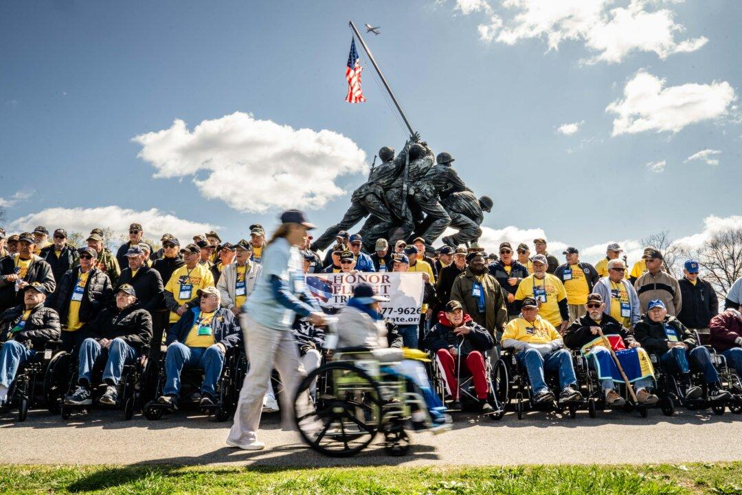 Veterans visit the U.S. Marine Corps War Memorial in Arlington, Va., on April 8, 2025. Honor Flight Tri-State brought veterans from Ohio, Kentucky, and Indiana on a day trip to Washington to visit its war memorials. (Madalina Vasiliu/The Epoch Times)