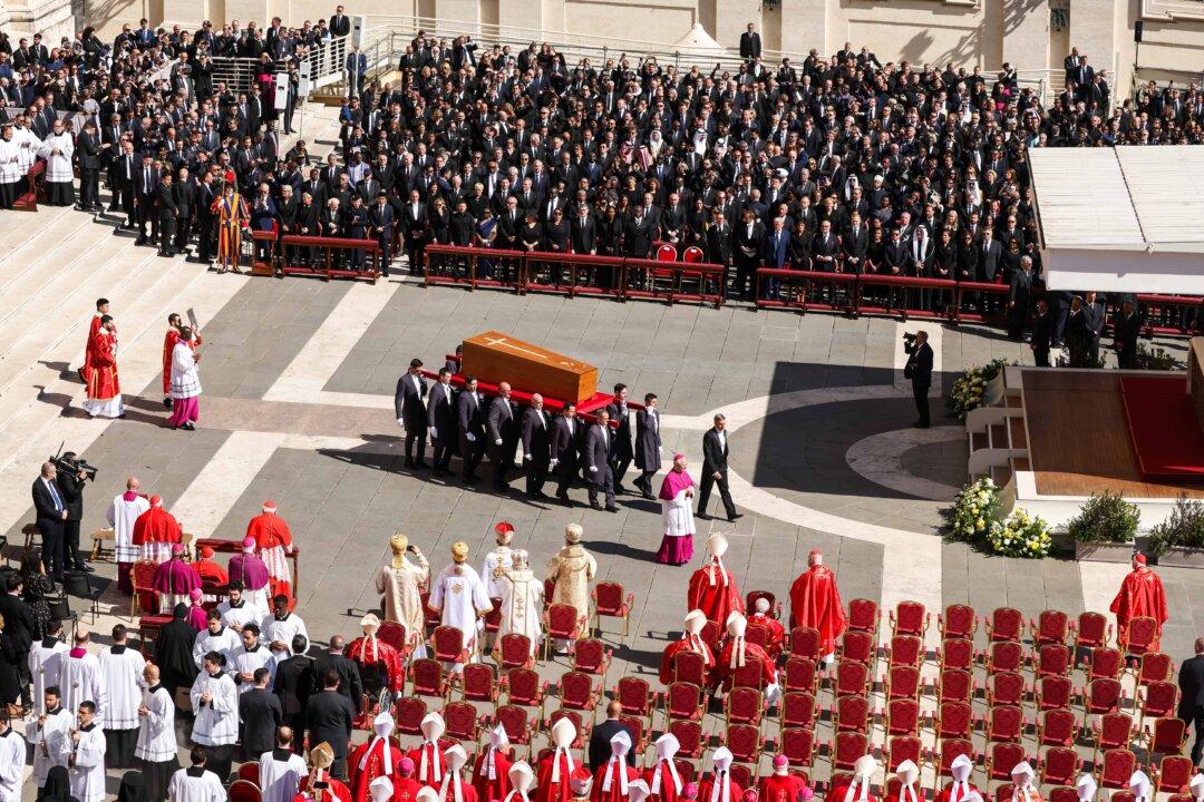 Pallbearers carry the coffin during the funeral of Pope Francis in St. Peter's Square in Vatican City on April 26, 2025. Pope Francis died April 21 at the age of 88. Born in Argentina as Jorge Mario Bergoglio, he was the first Latin American and the first Jesuit to become Pope when elected in 2013. (Dan Kitwood/Getty Images)