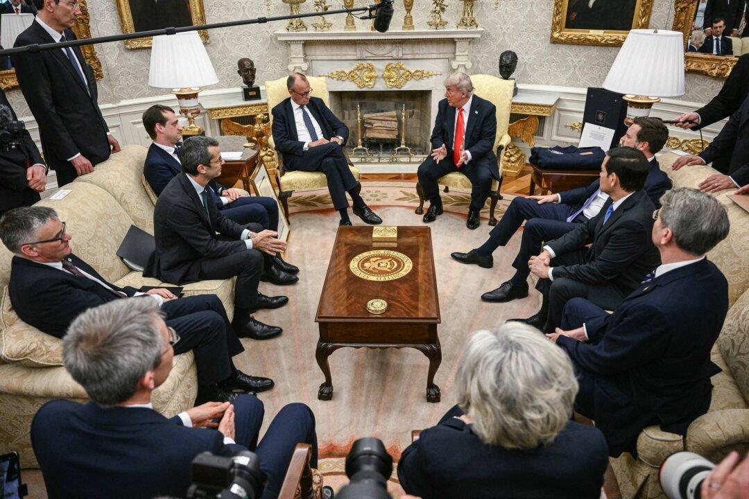U.S. President Donald Trump (R) and German Chancellor Friedrich Merz (L) meet during a bilateral meeting in the Oval Office on June 5, 2025. A month into his job, Merz seeks to build a rapport with Trump in efforts to maintain good ties with the country he considers post-war Germany's “indispensable” ally. (Brendan Smialowski/AFP via Getty Images)