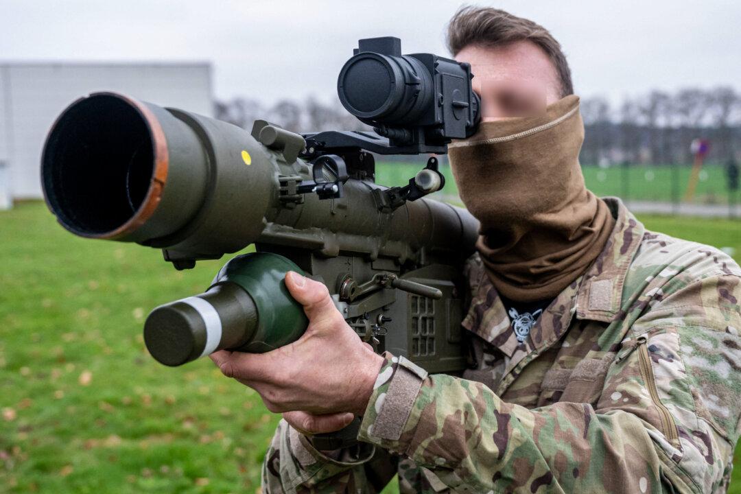 A Belgian Special Operations Regiment (SOR) soldier holds the PIORUN air defense system during a visit to the Hemptinne Command District for the official handover of the system to the SOR in Leuven, Belgium, on Dec. 23, 2025. (Jonas Roosens/Belga/AFP via Getty Images)