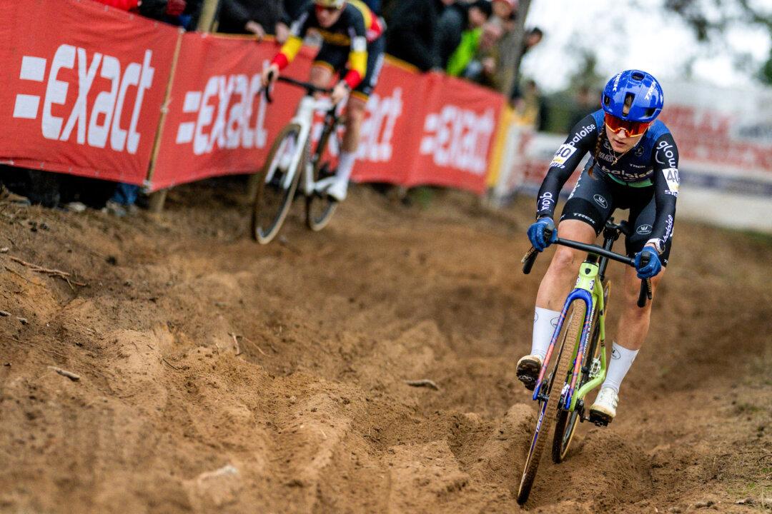 Belgium's rider Fleur Moors competes in the Women Elite Race cyclocross event in Heusden-Zolder, Belgium, during the Superprestige competition on Dec. 23, 2025. (David Pintens/Belga/AFP via Getty Images)