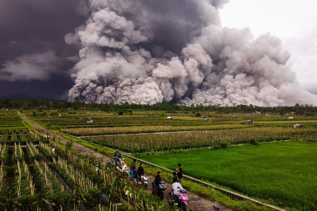 An aerial picture shows a pyroclastic flow during the eruption of Mount Semeru in Lumajang, East Java, Indonesia, on Nov. 19, 2025. (Agus Harianto/AFP via Getty Images)