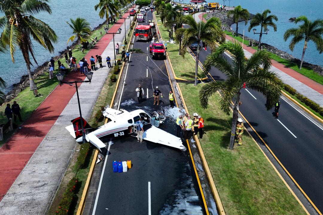 Aerial view of a Beechcraft Bonanza Model 33 (BE-33) aircraft after it made an emergency landing on the Amador Causeway, in the bay of Panama City, on Dec. 11, 2025. Authorities reported no fatalities, and the cause of the accident remains unknown. (Mauricio Valenzuela/AFP via Getty Images)