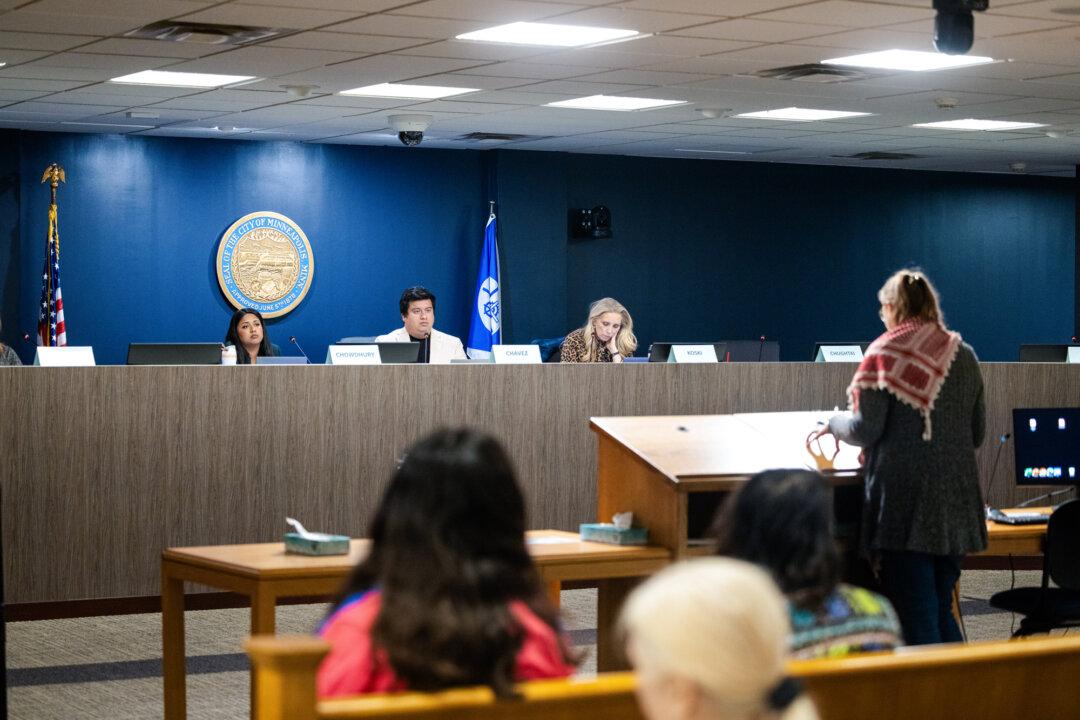 Minneapolis City Council members convene a public hearing to consider revisions to the city’s separation ordinance barring cooperation with federal immigration authorities in Minneapolis on Dec. 9, 2025. (Jenn Ackerman for The Epoch Times)