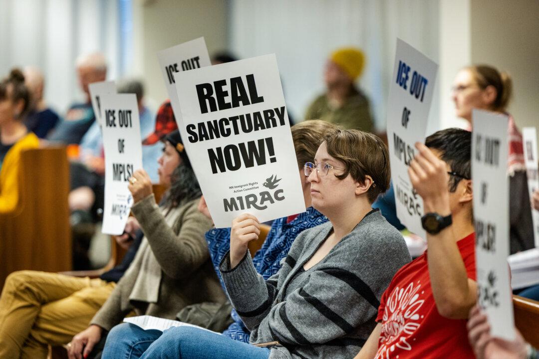 Community members gather for a public hearing as the Minneapolis City Council considers strengthening the city’s separation ordinance barring cooperation with federal immigration agents in Minneapolis on Dec. 9, 2025. (Jenn Ackerman for The Epoch Times)